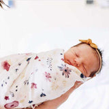 A 70% bamboo baby swaddle baby